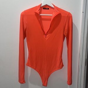 Fashion Nova Long Sleeve Zipper Seamless Bodysuit in Coral 🪸